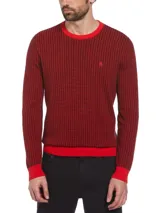 Sweater de punto con diseño jacquard bitono en rojo y negro, cuello redondo y logo bordado en el pecho.