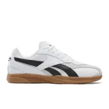 Championes Reebok Hammer Street de cuero blanco con detalles en negro, gris y amarillo. Suela de goma color caramelo.