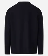 Remera de manga larga con cuello redondo y textura acanalada, confeccionada en una mezcla de poliéster y algodón.