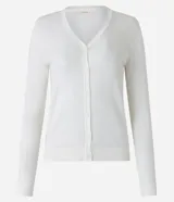 Cardigan de punto fino color gris, con escote en V, cierre frontal con botones y mangas largas. Confeccionado en una mezcla de viscosa y poliamida.