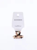 Pinza para el pelo color blanco traslúcido con diseño de flores.