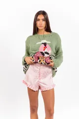 Short mini de jacquard tonal celeste con motivo de inspiración vintage y detalle de volados en el ruedo.