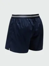 Boxer de pijama color azul marino, con cintura elástica negra que lleva el logo "BOSS" en blanco y dos líneas blancas a cada lado. Presenta una bragueta frontal con un botón visible.