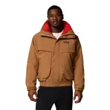 Campera técnica Columbia de estilo retro, color camel con forro interior en color rojo. Presenta cierre frontal con solapa, bolsillos frontales amplios, puños ajustables con velcro y cuello alto. Es una prenda versátil con sistema de intercambio que permite usar el forro por separado.