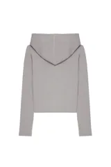 Camiseta de manga larga con capucha, confeccionada en tejido de punto, con cierre frontal parcial de botones y corte recto.