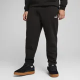 Pantalón de jogging negro con logo de Puma estampado en blanco en el muslo izquierdo.
