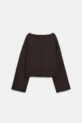 Sudadera de algodón con cuello barco y mangas largas acampanadas con terminación evasé. Presenta un diseño minimalista con bajo recto y bordes sin costuras visibles.