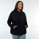 Buzo negro con capucha y cierre frontal, de corte holgado.