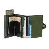 Billetera compacta de cuero verde con mecanismo de eyección de tarjetas y cierre a presión. Presenta el nombre "BALEINE" grabado en la parte inferior frontal.