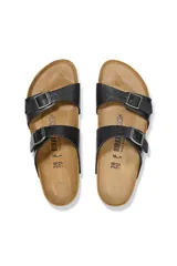Sandalias Birkenstock modelo Sydney Bf Graceful, color negro con dos correas ajustables con hebilla y plantilla anatómica de corcho y látex.