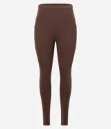 Legging deportivo de tiro alto con cintura texturizada, confeccionado en poliamida y elastano. Presenta un diseño ajustado al cuerpo con largo hasta el tobillo.