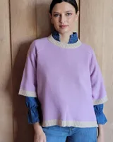 Sweater celeste de lana lambswool con cuello redondo y mangas 3/4.