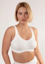 Soutien de microfibra sin costura, reforzado para mayor sujeción, sin aro ni copa, con breteles anchos.