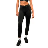 Calza deportiva Umbro modelo Nova, color negro, con cintura alta de diseño cruzado y ajuste al cuerpo.