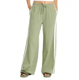 Pantalon Billabong de tejido punto color verde, corte ancho con franjas laterales blancas, cintura elástica con cordón de ajuste y bolsillos laterales.