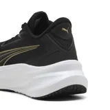 Championes Puma MaxStride Lite, de color negro con detalles dorados y suela gruesa blanca con tecnología Pumalite, diseñados para running y training.