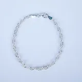 Pulsera de eslabones tipo tourbillon fabricada en plata 925, con cierre de mosquetón.