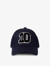 Gorra de béisbol color azul marino con visera curva. Presenta un parche frontal grande con el número "10" en blanco y negro, y la palabra "10DAYS" bordada verticalmente en el lado izquierdo del número.