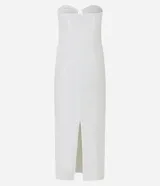 Vestido midi blanco sin breteles, confeccionado en bengalina. Presenta adornos en el busto y recorte cutout en la cintura.