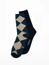 Pack de dos pares de medias de caña media con diseño a rayas. Un par presenta rayas finas horizontales en gris y negro, mientras que el otro par tiene rayas más anchas en gris y azul oscuro. Ambas incluyen el logo de la marca bordado en el lateral.