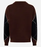 Buzo de tricot con cuello polo y diseño de patrón a cuadros en tonos bordó y negro. Presenta mangas largas y un calce amplio y relajado.