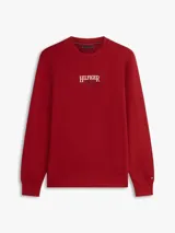 Buzo Tommy Hilfiger de cuello redondo color rojo, con puños y bajo acanalados, y logo bordado en el pecho.
