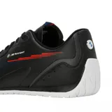 Championes Puma modelo BMW Motorsport Neo Cat 2.0, de diseño aerodinámico en color negro con detalles gráficos en rojo y azul. Presenta cierre de cordones y suela blanca de perfil bajo.