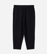 Pantalón de corte fluido y estilo pijama, color negro, con cintura elástica ajustable mediante lazo y detalle de tiras con hebilla en los tobillos.