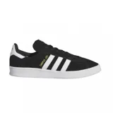 Championes Adidas modelo Campus ADV, color negro con las icónicas tres tiras laterales en blanco y suela de goma blanca. Presenta el nombre del modelo en letras doradas en el lateral.