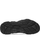 Championes de entrenamiento Under Armour modelo Halo Trainer, color negro. Presentan una estructura robusta con amortiguación reactiva UA HOVR, parte superior con perforaciones para ventilación y contrafuerte externo en el talón para mayor estabilidad.