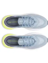 Championes Under Armour Turbulence 3 para running, color celeste con detalles en azul marino y suela blanca con refuerzo amarillo en el talón.