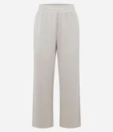 Pantalón de corte recto con cintura elástica y lazo de ajuste frontal. Confeccionado en tejido modal con caída fluida y estructura cómoda.