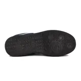 Championes Austral modelo Boreal para mujer, en color negro con detalles en beige y suela oscura de goma.