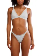 Bralette de algodón con escote profundo y bordes terminados en encaje delicado.