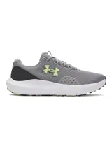 Championes de running Under Armour Charged Surge 4 para hombre, de color gris con detalles en verde lima y negro, con entresuela blanca y capellada de malla transpirable.