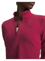 Buzo deportivo Under Armour Motion 1/2 Zip de color fucsia, con cuello alto, cierre frontal parcial y manga larga.