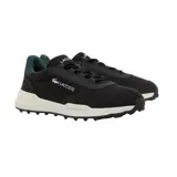 Championes Lacoste modelo Elite Active Evo, color negro con detalles en verde oscuro y suela blanca. Diseño deportivo con paneles de tela y refuerzos de gamuza, logo de la marca en el lateral y en la lengüeta.