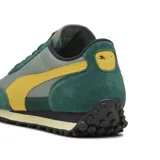 Championes Puma Easy Rider Weathered, color verde con detalles en amarillo y gris.