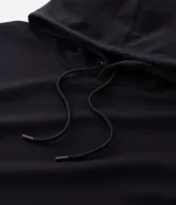 Buzo de pijama con capucha ajustable y cordones, confeccionado en tejido de modal con acabado suave. Presenta mangas largas, puños y ruedo acanalados, ofreciendo un calce holgado y confortable.