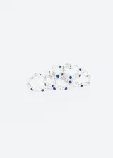 Anillo sin fin de plata 925 con diseño de flores y zirconias azules y blancas.