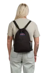 Mochila JanSport Draw Sack azul marino con logo rojo estampado, cierre superior con cordón ajustable y bolsillo frontal con cierre.