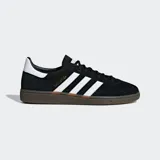 Championes Adidas Handball Spezial negros con detalles en blanco y suela de goma color caramelo.