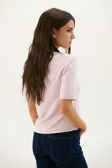 Remera manga 3/4 color celeste.