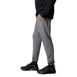 Pantalón jogger Columbia Hike Jogger Omni-Shield de color gris, con cintura elástica y cordón ajustable, bolsillos delanteros, dobladillos elásticos y bolsillo trasero con cierre. Incorpora tecnología Omni-SHIELD resistente al agua y a las manchas, y detalles reflectantes.