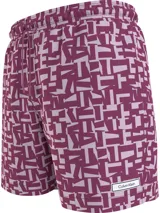 Short de baño morado con estampado geométrico en blanco, cintura elástica con cordón ajustable, bolsillos laterales y trasero, forro de malla y logo de Calvin Klein en el dobladillo.