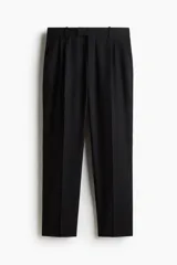 Pantalón sastrero de corte regular fit, confeccionado en una mezcla de algodón y lino. Presenta diseño con pinzas frontales, cierre de cremallera con botón oculto, bolsillos laterales y bolsillos traseros ribeteados.