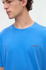 Remera de manga corta color gris oscuro con efecto lavado, corte holgado y gran estampado en la espalda con la inscripción "Eat Pasta".