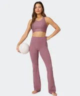 Pantalón flare negro de tiro alto, confeccionado en tejido PureLuxe ultrasuave, con diseño acampanado en las pantorrillas.