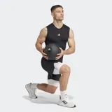 Short de compresión deportivo Adidas Techfit, color blanco con logo negro en la pierna izquierda y cintura elástica negra con la inscripción "Techfit" en blanco.