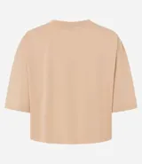 Remera cropped de manga corta, cuello redondo y calce oversized, confeccionada en tejido de algodón tipo media malla.